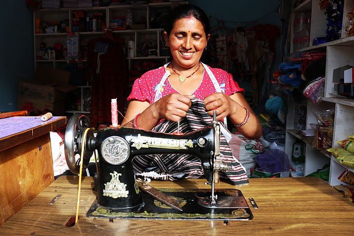 Sabitri sewing clothes is also a member of Jitpur cooperative